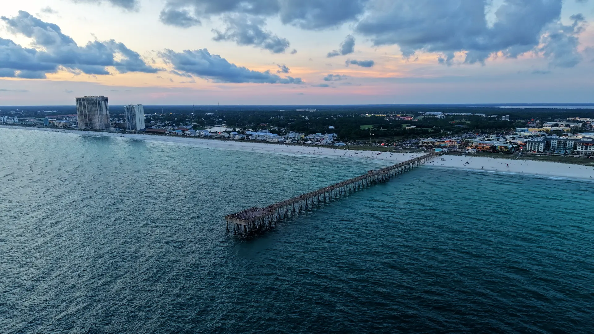 HDR aerial photo of the Panama City Beach pier and coastline at sunset by JandyLucho Marketing and Media