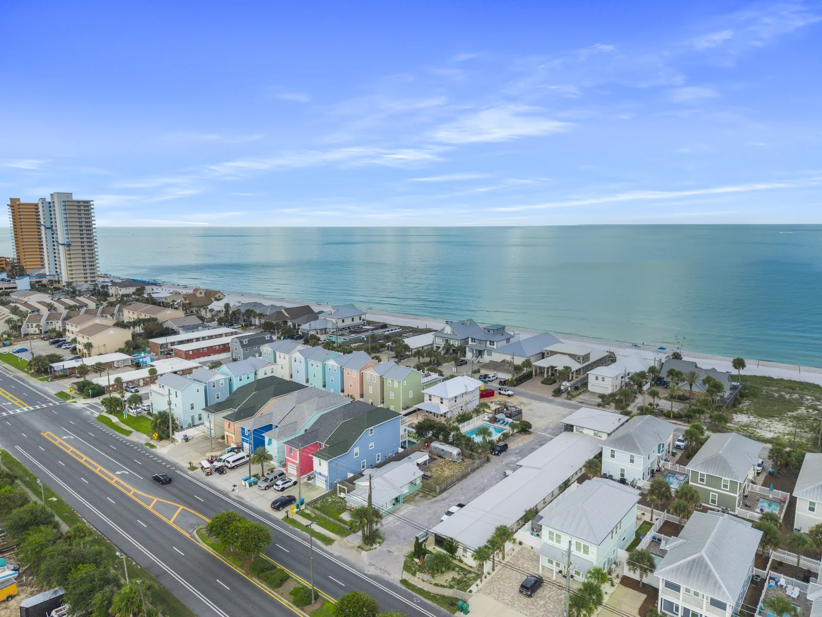 Aerial view down a Panama City Beach FL street toward the Gulf