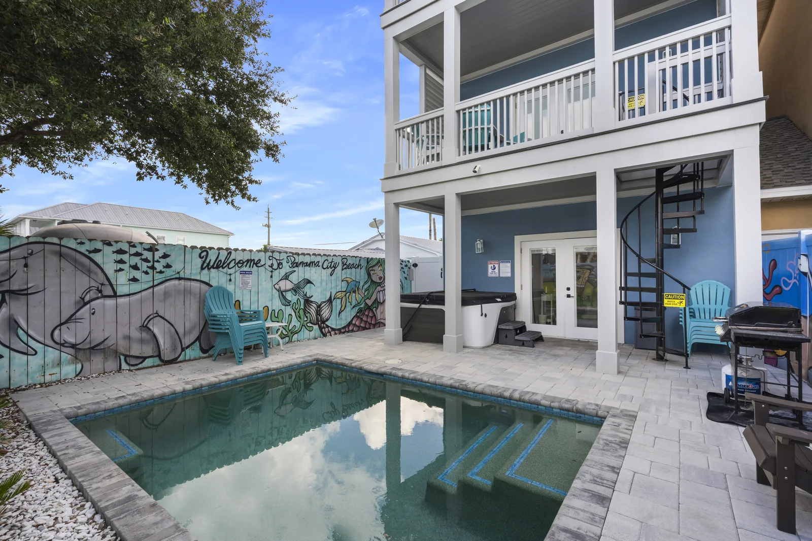 Private pool and rear elevation of a three-story Panama City Beach FL vacation rental